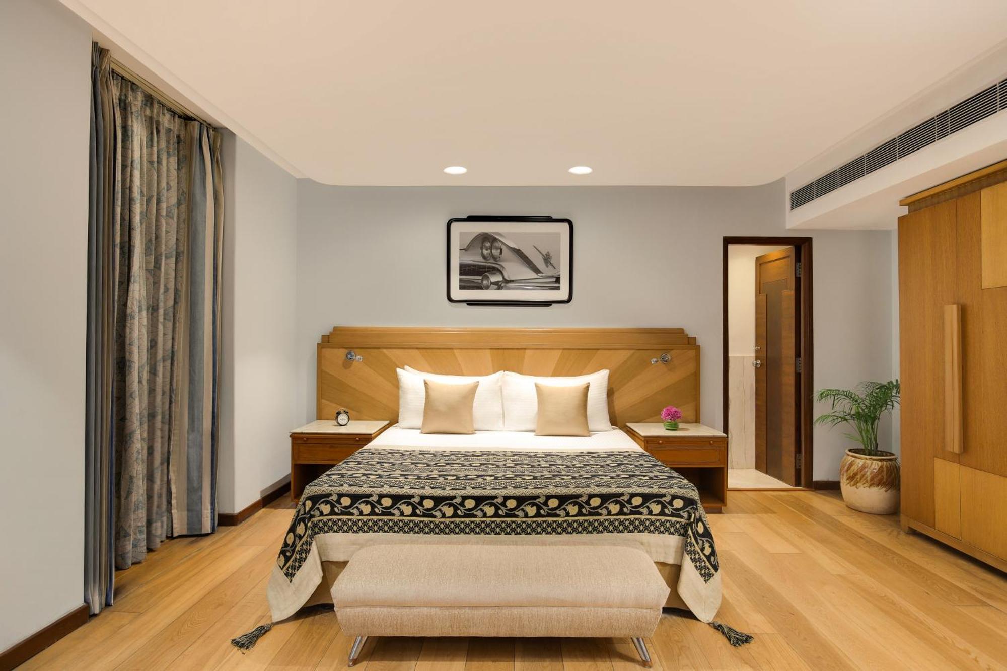 앰배서더 - Ihcl 셀렉션 뉴델리 외부 사진 A bedroom at the Taj Bengal