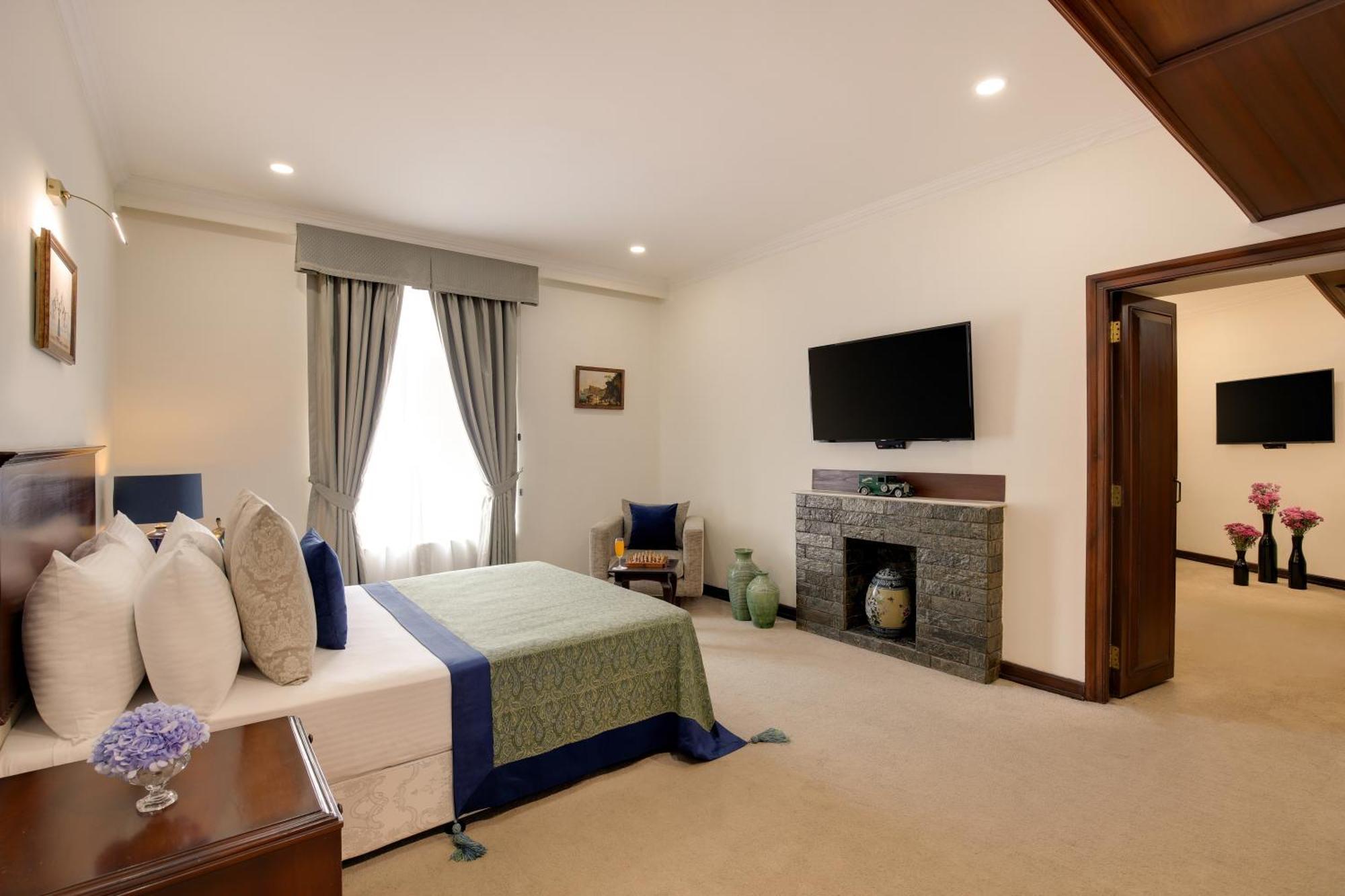 앰배서더 - Ihcl 셀렉션 뉴델리 외부 사진 A bedroom at the Taj Bengal